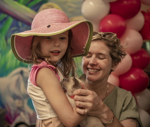 : 5-year-old Emma June Major, left, and her mom Emma McMullen spend time with a kitten they adopted and named Willa.