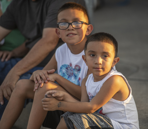 Lucas Martinez, 5, front, and his brother Jaiden, 8, watch as parade  participants march along Main Street during Taylor's Patriot Day observance on Monday, September 11, 2023.  
