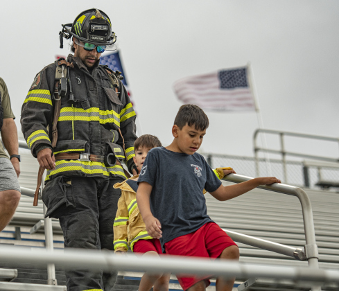 Georgetown Fire Department firefighter  Jonathan Marquez was joined by his sons Micah, 6, and Jude, 10, during the Memorial Stair Climb.