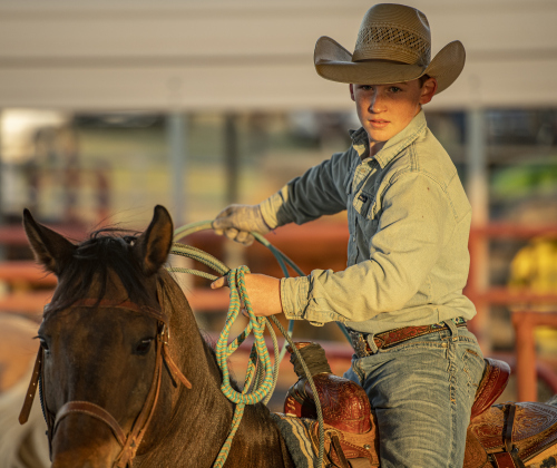 Mason Simpson, 13, prepares to compete in Team Roping.