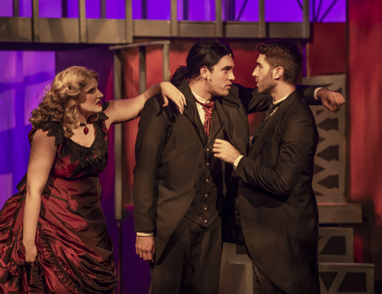 Cayden Couchman, center, playing Henry Jekyll and Edward Hyde, is pictured with Katya Welch, as Nellie, and Jacob Rosenbaum, right, as John Utterson,  in a Thursday, October 5, 2023 dress rehearsal of "Jekyll & Hyde," playing on the Palace's Springer Stage through November 5.    Photo by Andy Sharp. 
