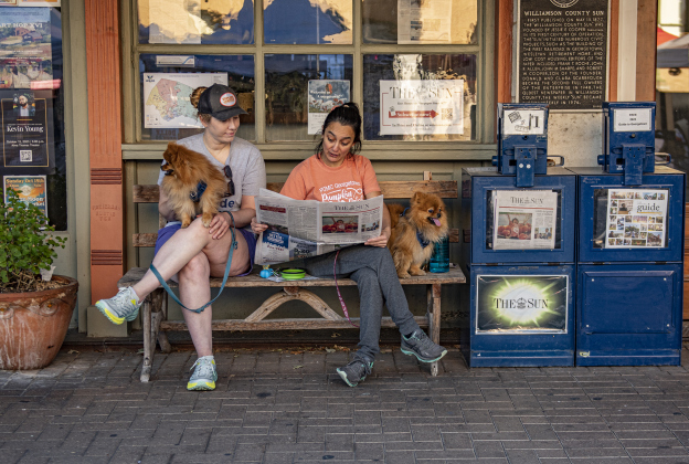 Lauren Zurbrugg, left, with Obi, and Natalia Ornelas, with Chewy, take a break from shopping  during Market Days  on Saturday, October 14, 2023.  Obi and Chewy are siblings.