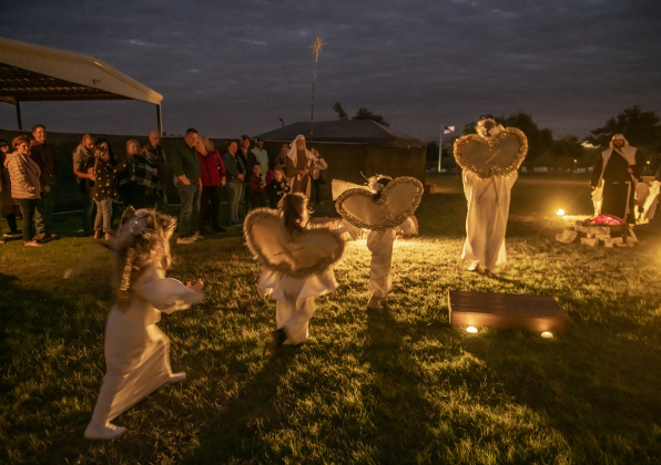 Angels make their way to the manger birth scene at  Immanuel Lutheran Church for  the Pilgrimage to Bethlehem, the church's Live Nativity, on Saturday, December 9, 2023.