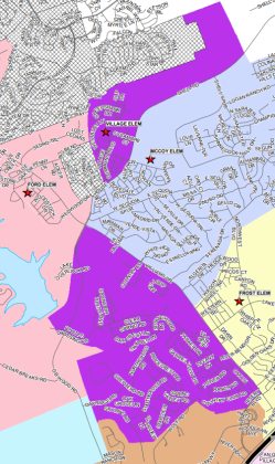 Village Elementary School's attendance zone is highlighted in bright purple.