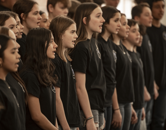 Members of the Forbes Middle School choir  perform during the Georgetown Independent School District State of the District event held at GISD headquarters on Thursday, February 15, 2024.    Photo by Andy Sharp.  