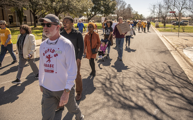Scott Butler (front),on Martin Luther King, Jr. Street,   was among those marching from the Georgetown square during the Dr. Martin Luther King, Jr. march and program held on Monday, February 19th, 2024. 