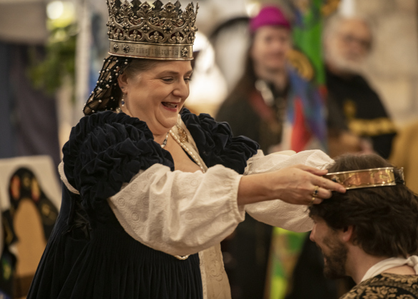 Queen Nicollet Deuville bestows honors on a subject during a weekend gathering of The Stellar Kingdom of Ansteorra  at the San Gabriel Community Center on Saturday, February 3, 2024.