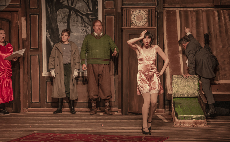 Morgan Urbanovsky, left, as Annie, Hayden Smith, second from left, as Max, Ross Millsap, center, as Robert, Mikah Mazza, second from right, as Sandra, and Leslie Hethcox, right, as Dennis,  are shown in a Thursday, February 9, 2023 photo during the dress rehearsal for the Georgetown Palace production of "The Play That Goes Wrong."