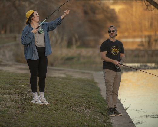 Nadia and Jared Reynolds enjoyed a late-afternoon fishing outing together  at San Gabriel Park on Wednesday, January 10, 2024. Temperatures reached into the 60s, prompting many get outdoors today, but the weather is expected to turn frigid by this weekend and into early next week.    Photo by Andy Sharp. 