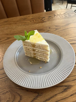 Country White Cake- buttercream frosting between each layer, lemon citrus glaze on top