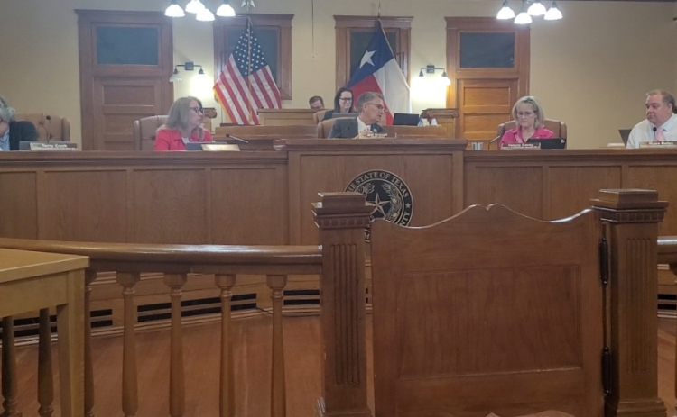 The Williamson County Commissioners Court deliberates about bond allocations during the March 19 meeting at the county courthouse.  Photo by Nalani Nuylan.
