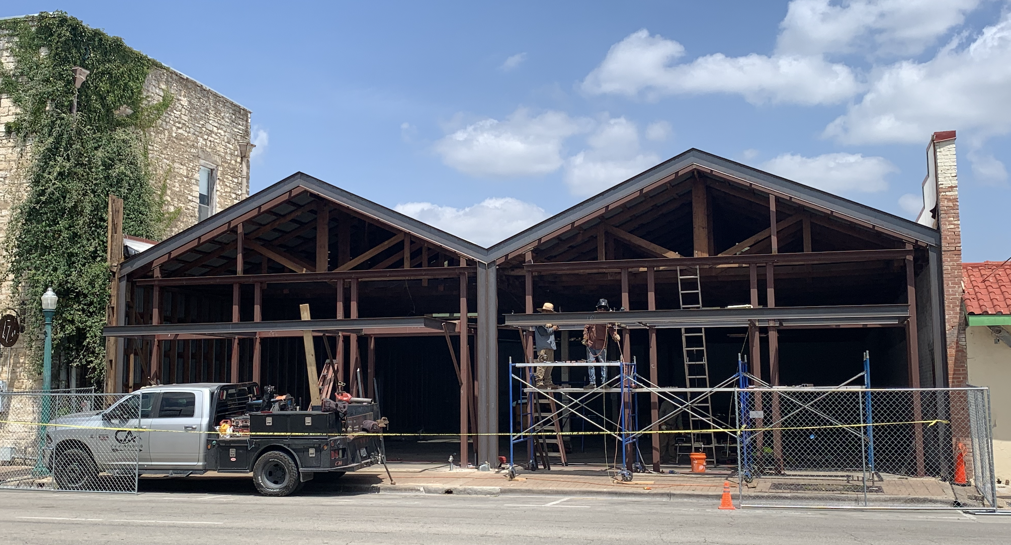 Contractors renovate a downtown space at 817 South Austin Avenue July 29. Projects like this in the future will have to follow updated Unified Development Code standards for downtown structures. New Georgetown building and environmental rules will go into effect this November. (Photo by Kaitlyn Wilkes) 