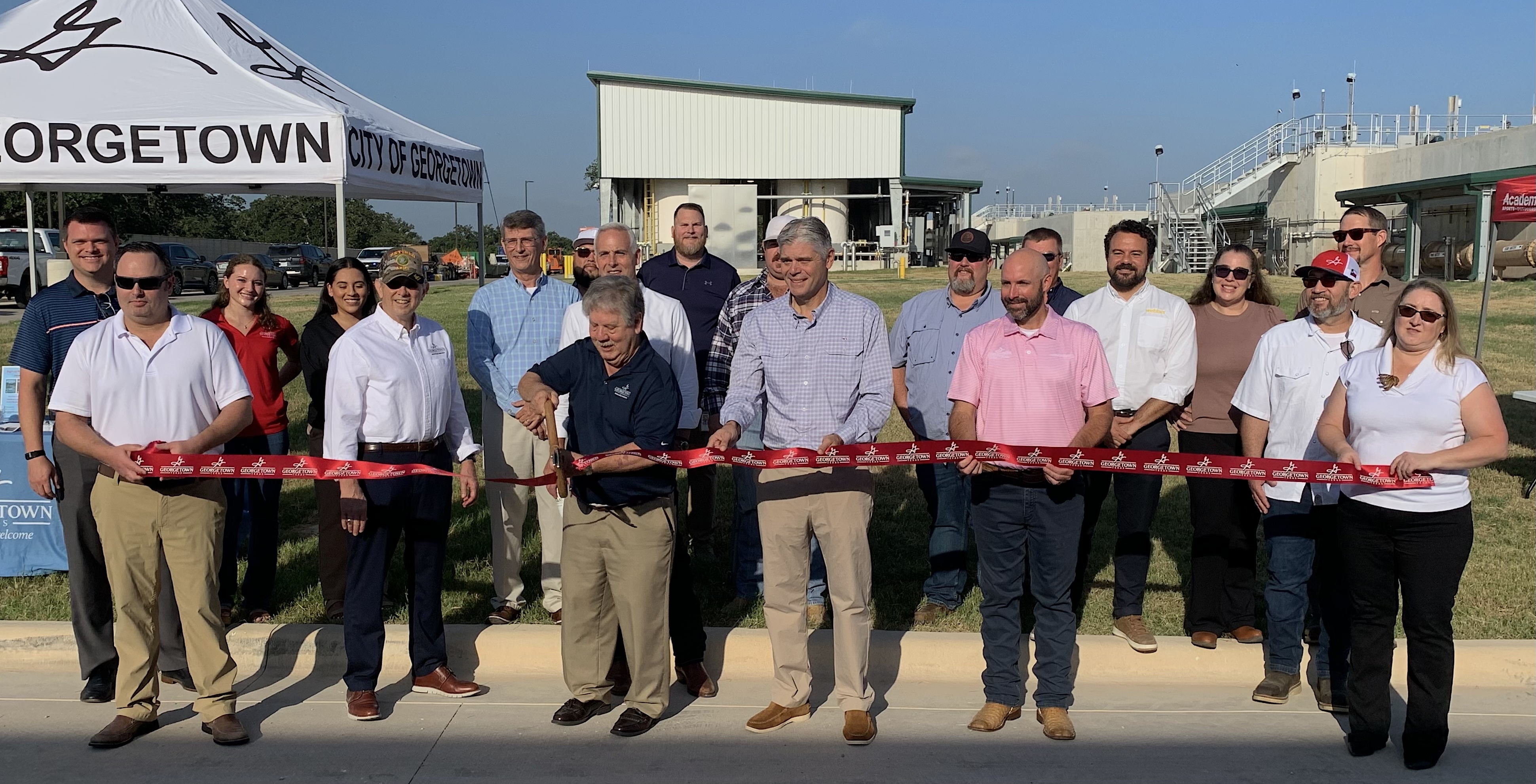 Members from the City of Georgetown, plant contractor Webber and design engineering firm CDM Smith gather to cut the ribbon on the opening stage of the South Lake Water Treatment Plant on August 4. (Photos by Kaitlyn Wilkes) 