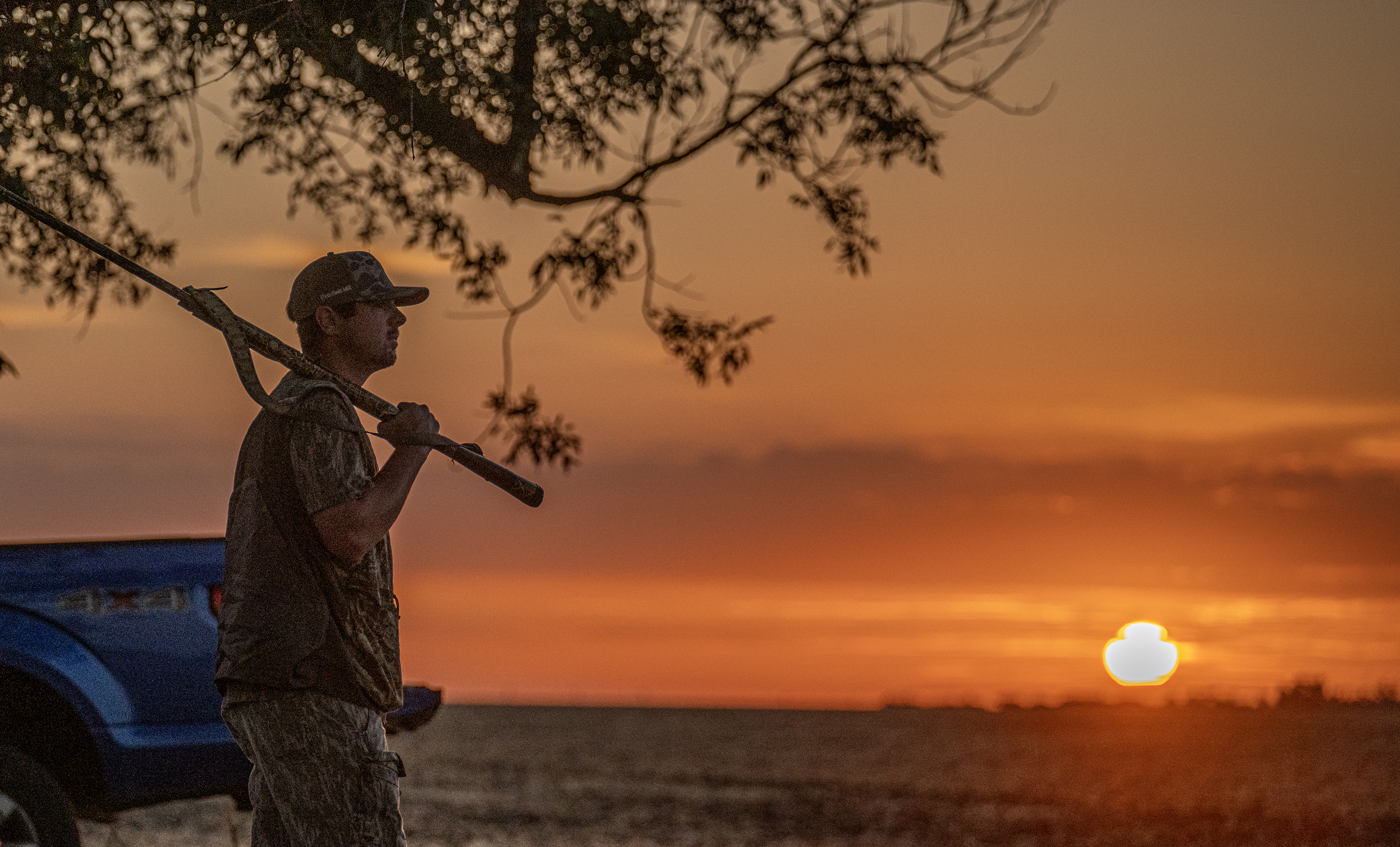 Kyle McAllen of Shreveport watches the eastern sky as the sun rises over County Road 409 in Williamson County just after 7a.m. on Tuesday, September 1, 2026, the opening day of dove season in Central Texas.  Photo by Andy Sharp. 