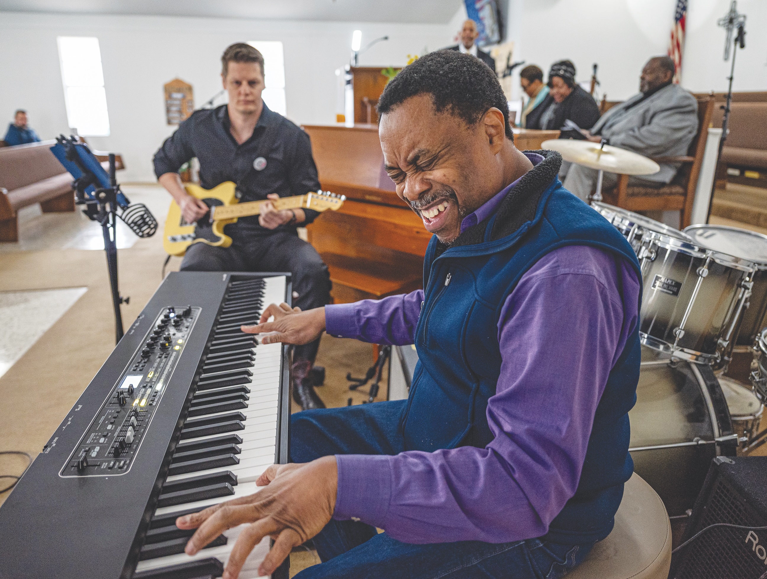 Paul Morris, front, and Eric Hanks, on guitar, offer musical selections during the Dr. Martin Luther King Jr. Day march and celebration held at Macedonia Baptist Church  on Monday, January 20.  