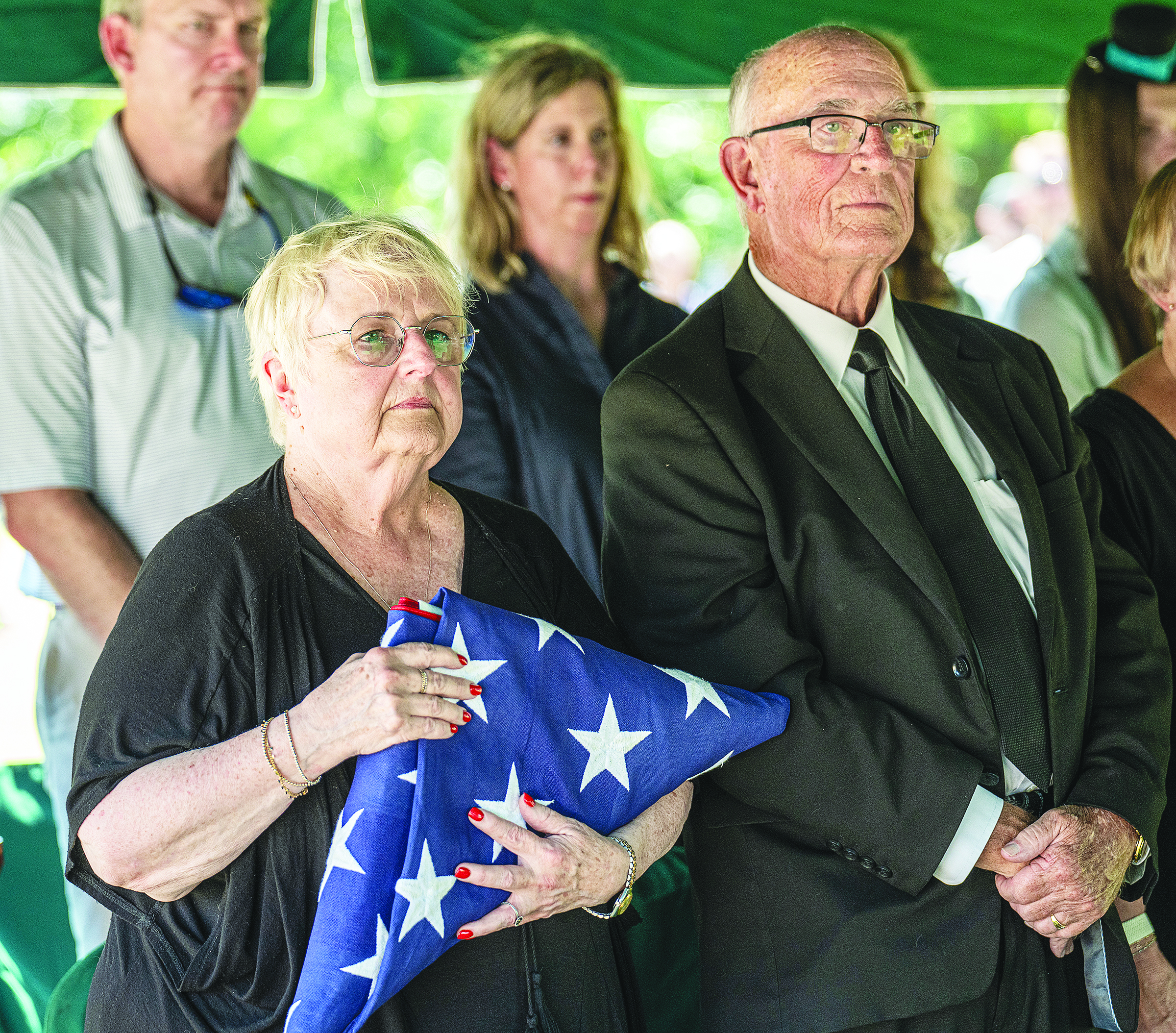 Diane Benefiel, left, and her brother, John McCook, niece and nephew of  First Lt. Charles Woodruff McCook, were present at his burial service held in IOOF Cemetery on Saturday, August 2. McCook, a Georgetown native, died on August 3, 1943  during World War II when the B-25 he was piloting was struck in a mission over Burma. Photo by Andy Sharp