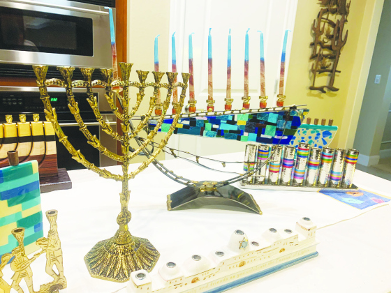 A collection of traditional chanukiahs and elaborate menorahs. The candle holders are perhaps one of the most recognizable symbols of Hanukkah, the Jewish festival of lights celebrated every year in the winter time. This year, Hanukkah begins December 18. BRIGID COOLEY