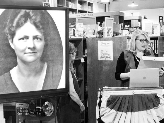 Georgetown District 1 Council Member Amanda Parr reads a city proclamation marking November 2 as Jessie Daniel Ames Day.