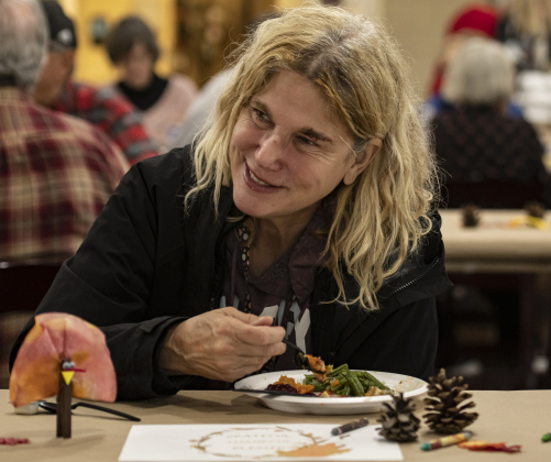Lisa Burgly enjoys her meal.
