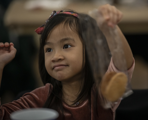 Four-and-a-half year-old Zoe Nguyen gets ready to enjoy cookies.