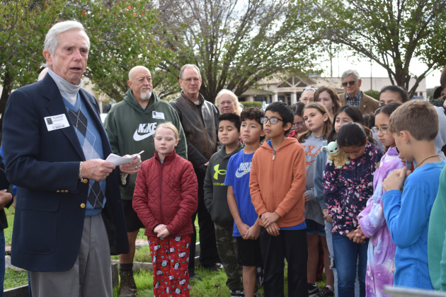 Rotarian Jim Deuser talks with Cooper students about how they can use the Peace Garden. (Photo by Katherine Anthony)