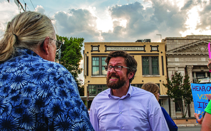 Abortion rights advocate Eric, who only gave his first name, argues with Bradley Helgerson, pastor at the Church on the Square during an abortion rights demonstration held at the square  on Sunday, July 10, 2022.  Helgerson was joined by members of his church and attendees from Georgetown's Covenant Bible Church.