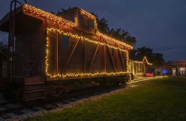 The community of Coupland is decked out for the Christmas holiday season with lights around the depot, caboose and tracks Sunday, December 11. (Photos by Andy Sharp)  