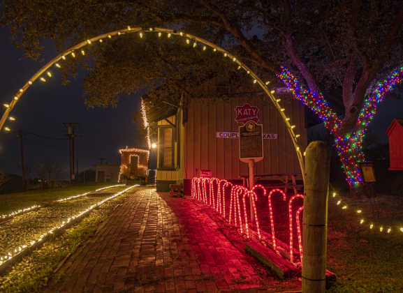The community of Coupland is decked out for the Christmas holiday season with lights around the depot, caboose and tracks Sunday, December 11, 2022.  