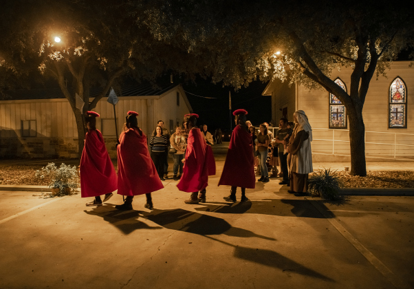 Participants dressed as Roman soldiers guide visitors.