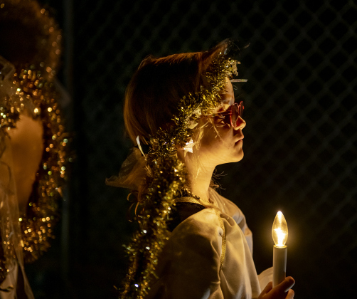 5-year-old Heidi Walters waits with other angels to take part in the manger scene.
