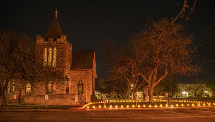 Luminaries adorn the grounds of St. John's United Methodist Church on Thursday, December 15.