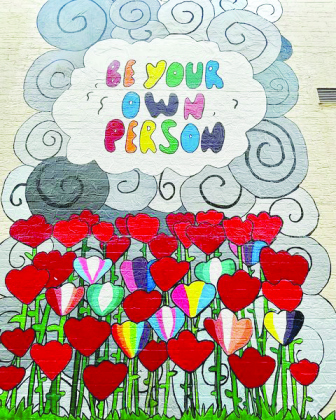 A mural encouraging Georgetown residents and visitors to “Be Your Own Self” is at the center of a controversy, with some church goers speaking against design elements that could represent the LGBTQ+ community.
