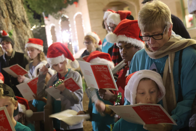 Children from the First Presbyterian Church LOGOS Program spread Christmas cheer in downtown Georgetown earlier this month. Children look forward to dressing up in Christmas attire and singing their favorite carols for visitors downtown during the annual event for the church, which sits just one block east of the square. (Photos courtesy Ron Parks Photography)