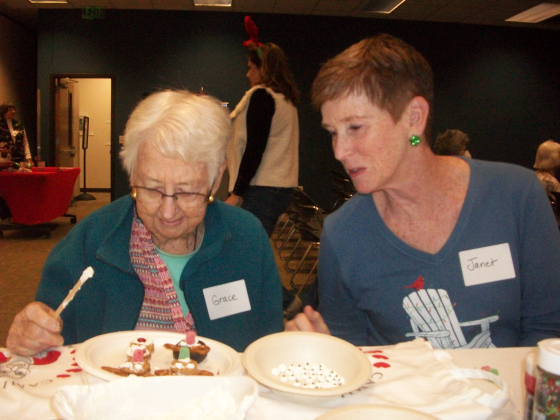 Janet Morton (right) and her mother, Grace Callahan, decorate Christmas goodies.