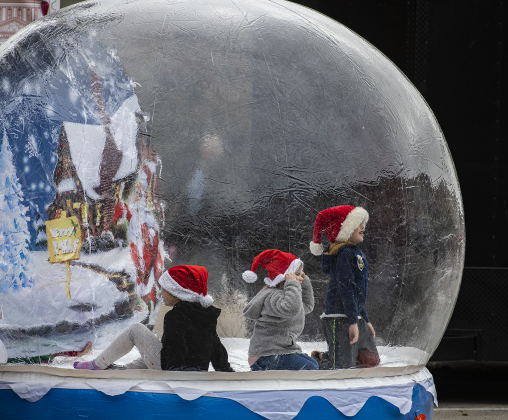 Siblings (from left) Violett Cain, 6, Jupiter Cain, 4, and Holden Cain, 7, spend some time in the Snow Globe.