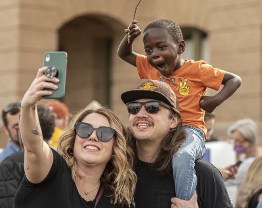 Matt and Stephanie Madsen and  their son Breck, 4, pose for a self-portrait together before taking part in the  march. The event is coordinated by the Georgetown Fellowship of Churches.