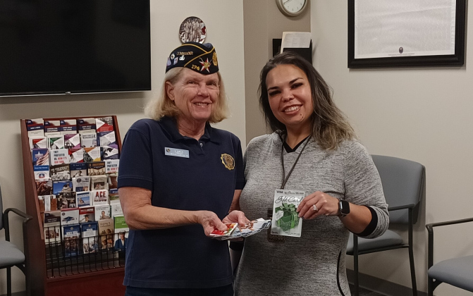 From left is American Legion Post 174 Commander BJ MacMillan and Cathy Jo Johnson, veterans services officer.