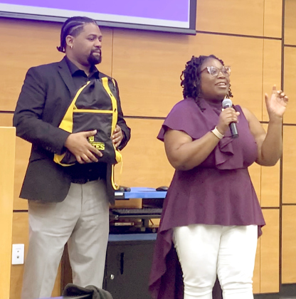 Dr. Malissa Ismaila, right, Southwestern’s director of student inclusion and diversity, addresses a crowd of roughly 25 people after Mr. Harris’ speech. (Photos by Brigid Cooley)