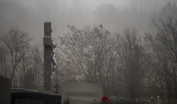 Morning fog encompasses St. Mary's Catholic Cemetery in Taylor on Sunday, January 1, the first day of 2023.