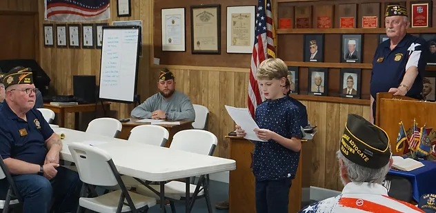 Patriot’s Pen winner Adrik Stepanov reads his winning essay to VFW Post 8587 members at the group’s monthly meeting. Adrik is 11 and attends Meridian World School as a sixth grader. His parents are Rachel and Yegivny (Will) Stepanov. 