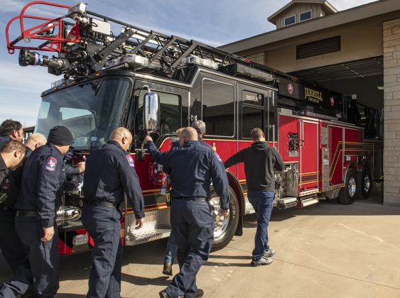 Jarrell firefighters participate in a push-in ceremony for the  department's new ladder truck during at Jarrell Station 2 on Friday, February 17.  Photo by Andy Sharp.