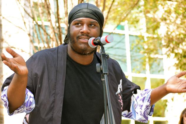 DeVonte Rogers speaks to those gathered during the protest February 22.