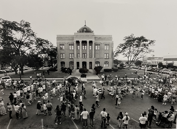 The Georgetown homecoming parade in October 2000 passes in front of the county courthouse.