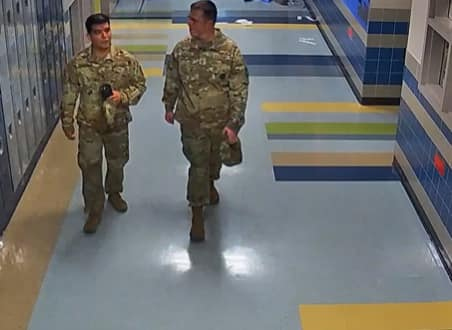 Soldiers from Fort Hood patrolled Jarrell Middle School hallways.