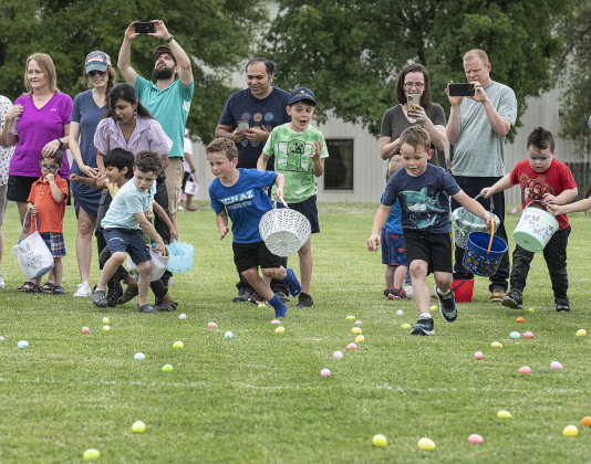 Children make a dash for eggs during the Georgetown Church of the Nazarene Easter Egg Hunt last year.