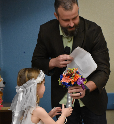 Georgetown City Council member Kevin Pitts officiated at the pretend wedding.