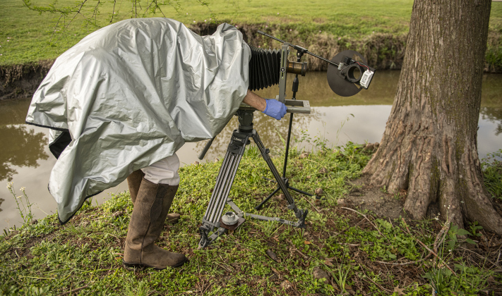 Georgetown photographer Tom Cavness is pictured at Bull Branch Park on April 9.
