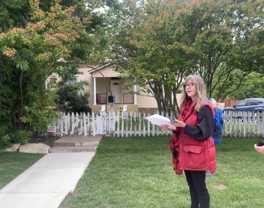 Georgetown historian Helen Cordes leads a poppy-themed history walk.