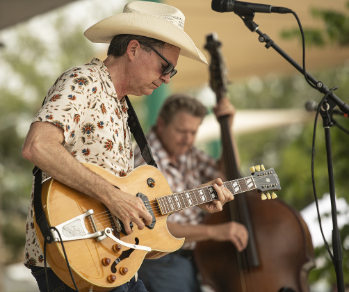 Jeremy Slemenda, front, and Christopher Crepps, back right, members of the Jerrells, a Georgetown-based band, perform.