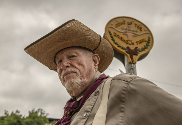 Docent Bob Brownfield was in his role as a Chisholm Trail Cowboy along Austin Avenue.